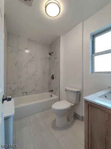 a view of balcony with wooden floor
