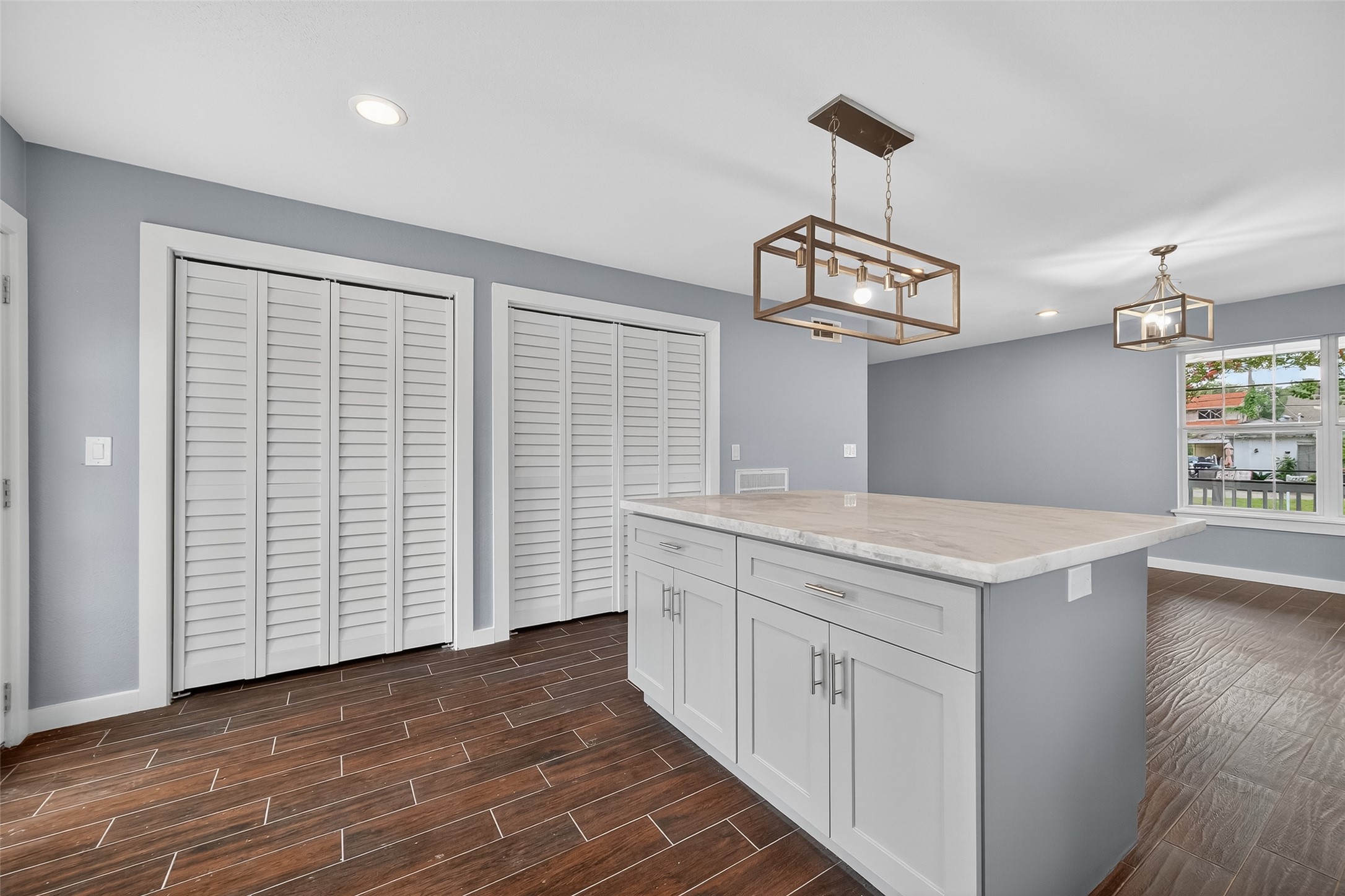 1933 Santa Rosa Street Houston, TX 77023 - Photo 21 of 44 a bathroom with a sink a mirror and a window