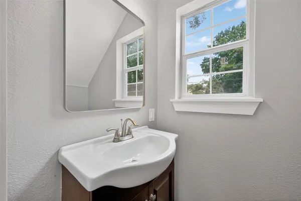 a white sink sitting next to a white sink