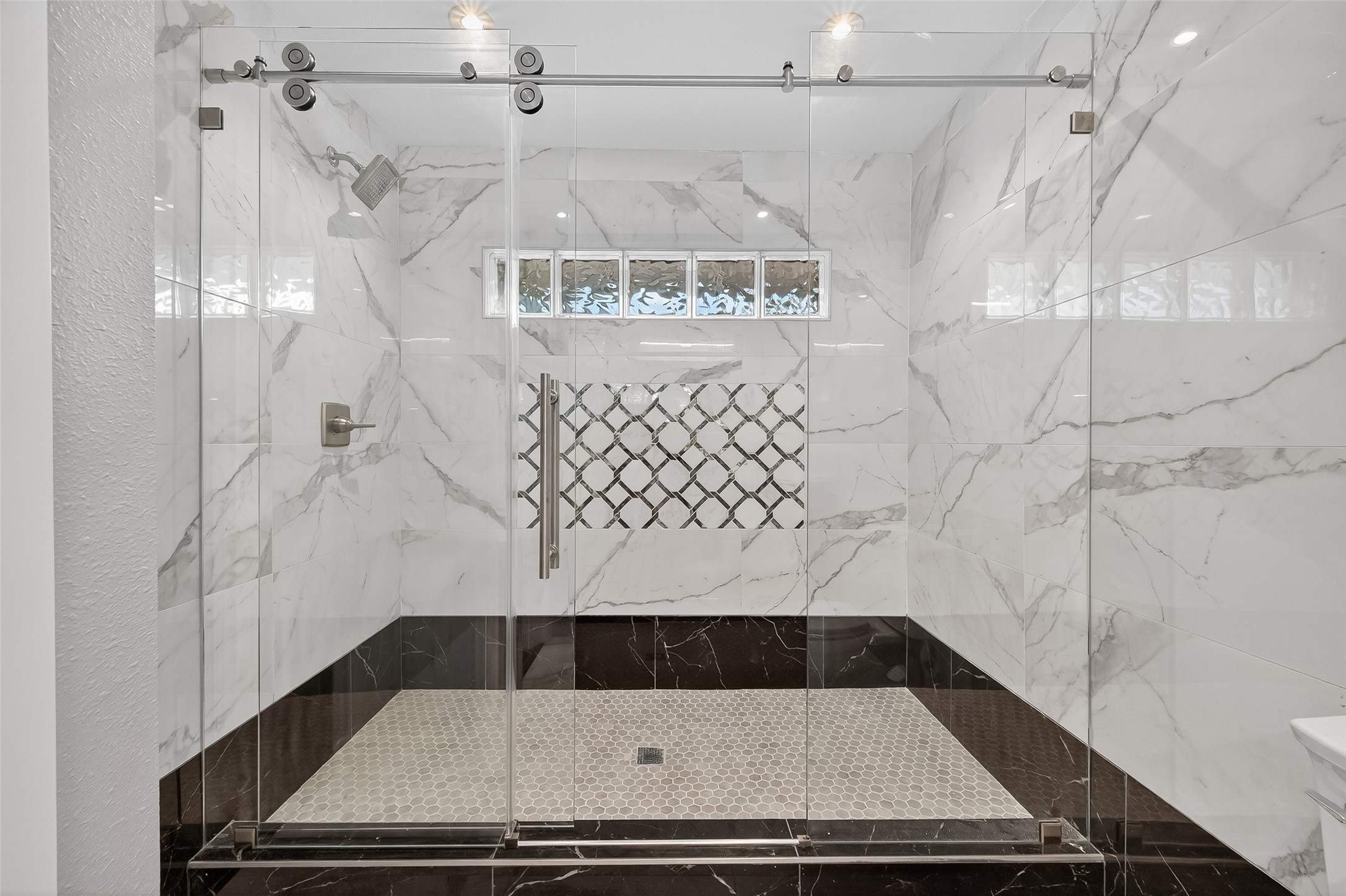 1933 Santa Rosa Street Houston, TX 77023 - Photo 38 of 44 a bathroom with a shower