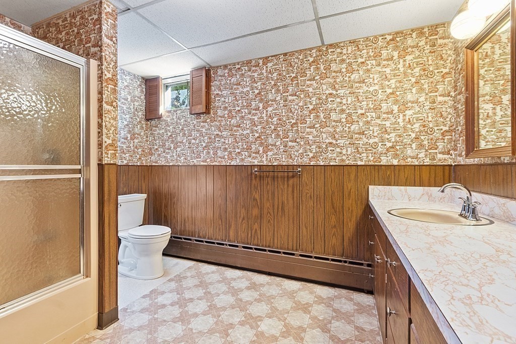 363 North Main Street Petersham, MA 01366 - Photo 23 of 32 a bathroom with a granite countertop sink and a toilet