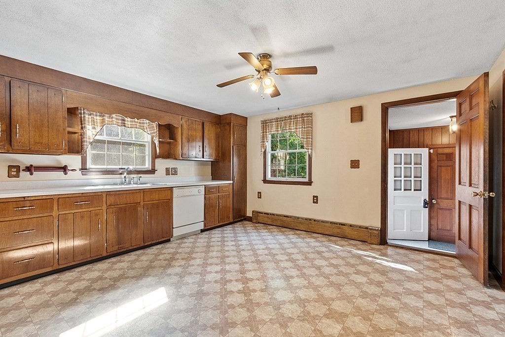 363 North Main Street Petersham, MA 01366 - Photo 8 of 32 a view of a kitchen with a sink and microwave