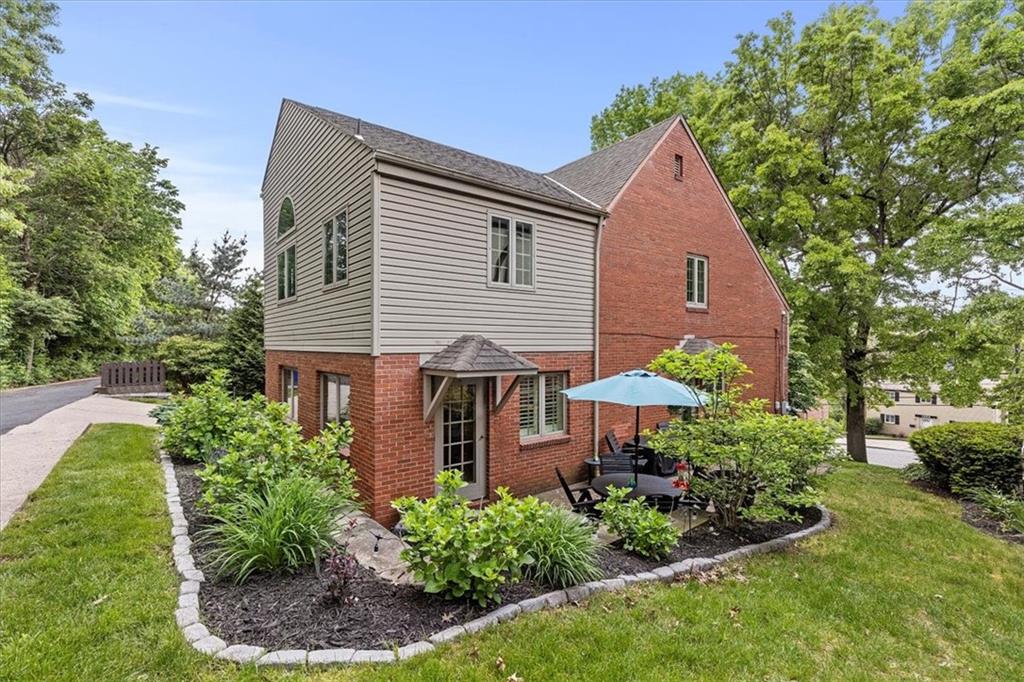 1385 Washington Road Pittsburgh, PA 15228 - Photo 42 of 46 Check out this side patio complete with stone highlights and beautiful landscaping