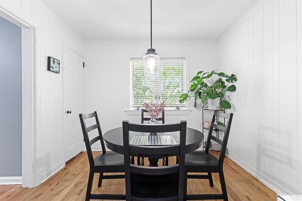 1385 Washington Road Pittsburgh, PA 15228 - Photo 7 of 46 Enjoy coffee and pancakes on those indoor type mornings in the breakfast area with natural light and hardwood flooring (powder room is thru the door in back left corner of the photo)