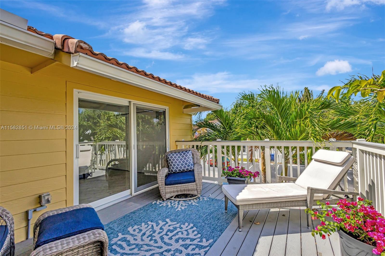 237 Seabreeze Circle Jupiter, FL 33477 - Photo 49 of 63 a balcony with furniture and a potted plant