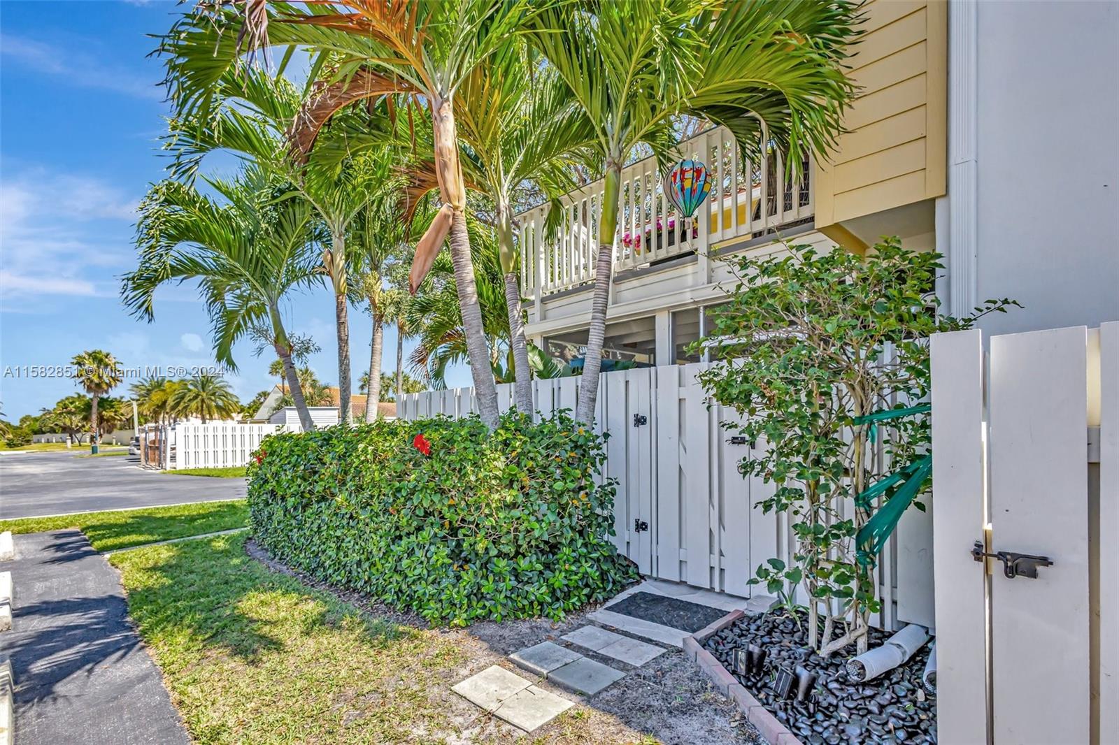 237 Seabreeze Circle Jupiter, FL 33477 - Photo 53 of 63 a view of a garden with potted plants