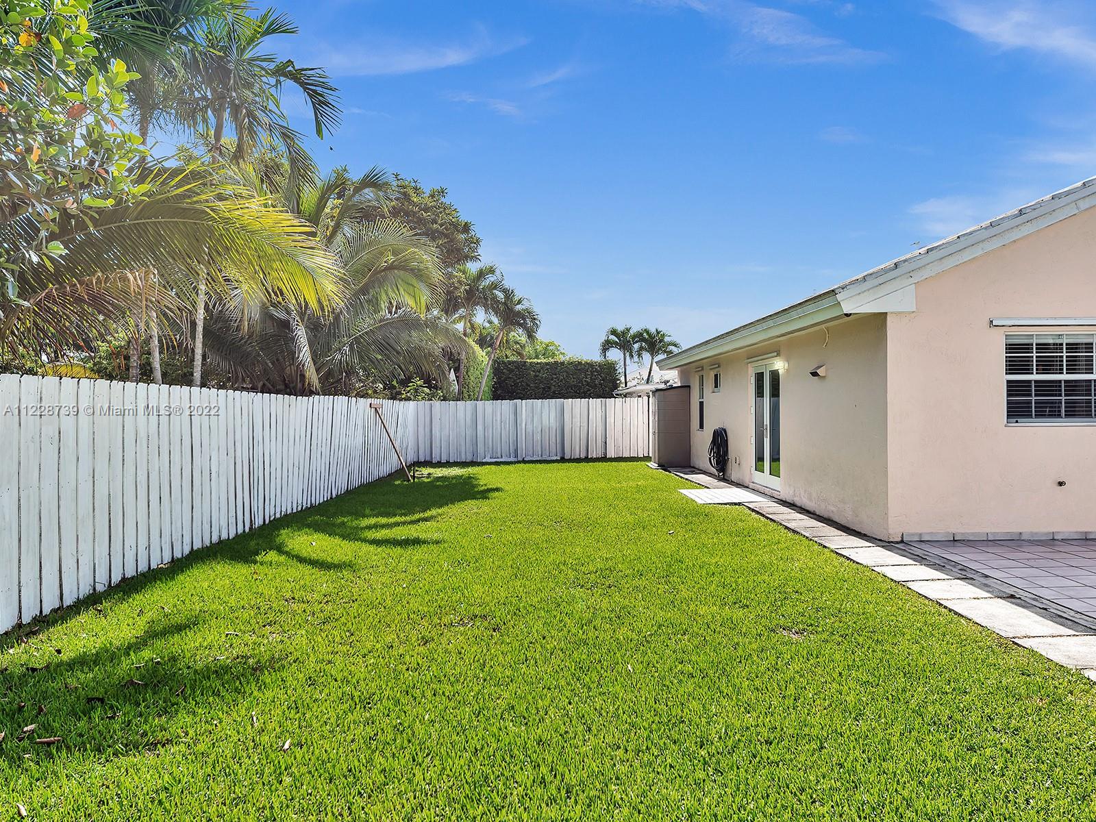 11291 Southwest 62nd Terrace Miami, FL 33173 - Photo 16 of 65 a view of a backyard with a tree