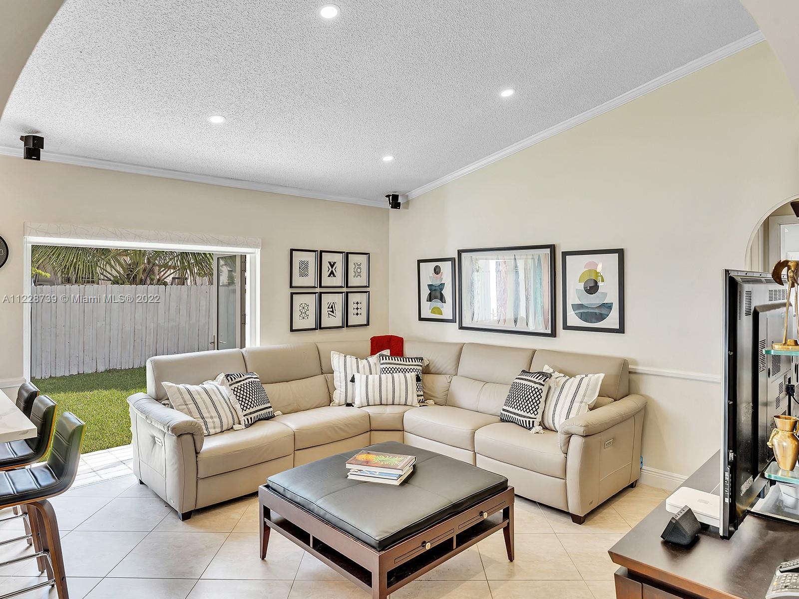 11291 Southwest 62nd Terrace Miami, FL 33173 - Photo 33 of 65 a living room with furniture and a couch