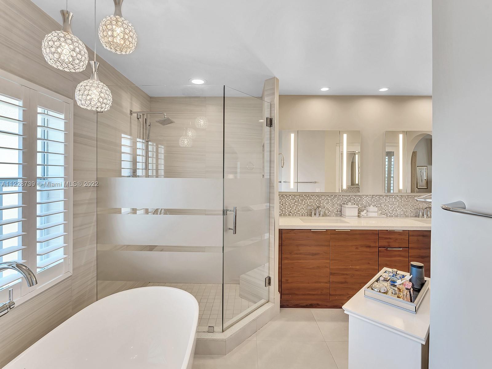 11291 Southwest 62nd Terrace Miami, FL 33173 - Photo 5 of 65 a bathroom with a sink a toilet and a shower