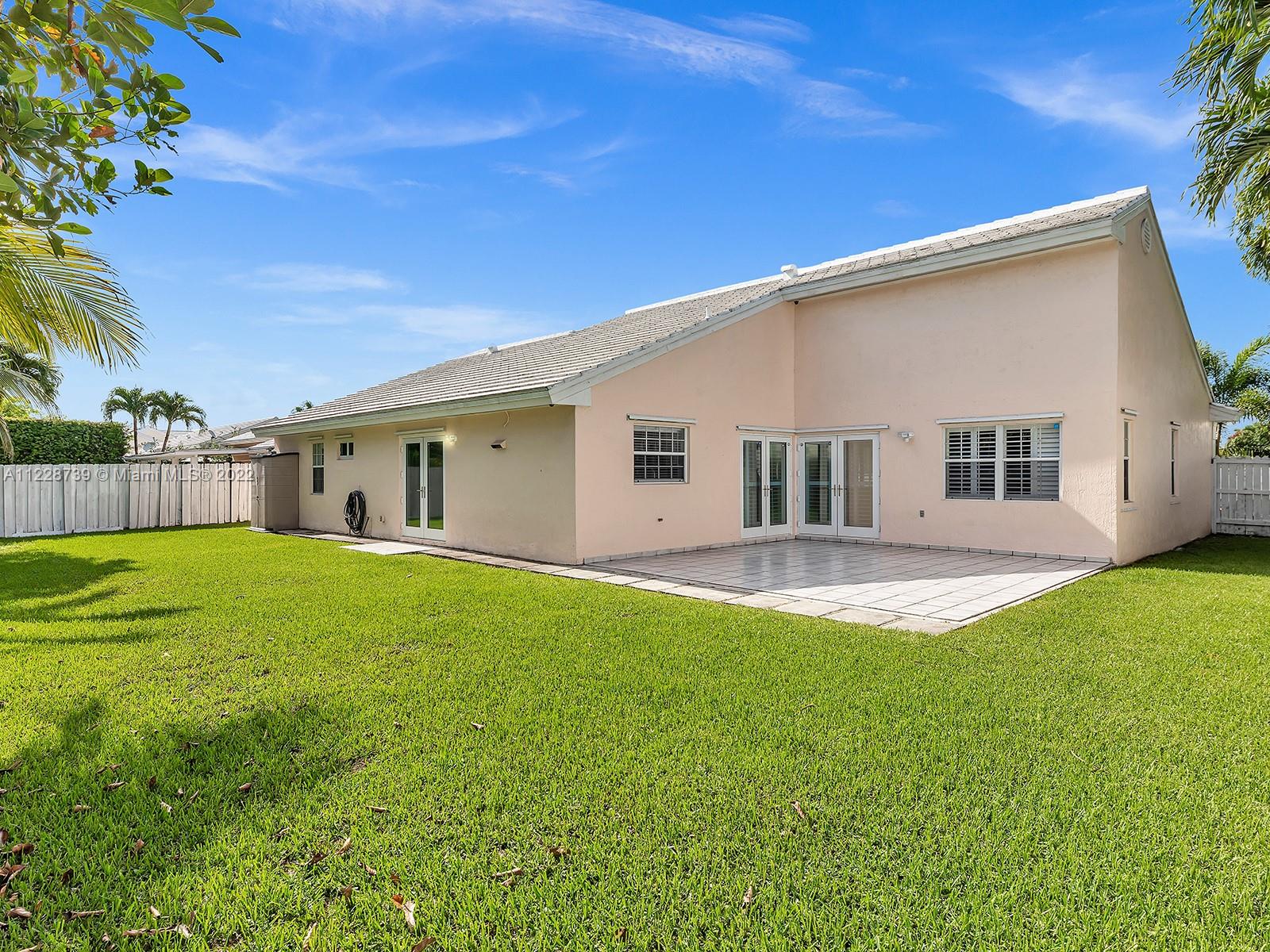 11291 Southwest 62nd Terrace Miami, FL 33173 - Photo 53 of 65 a view of a house with a backyard