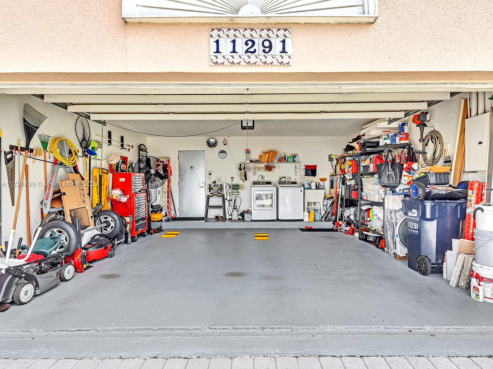 11291 Southwest 62nd Terrace Miami, FL 33173 - Photo 6 of 65 a view of a garage with storage