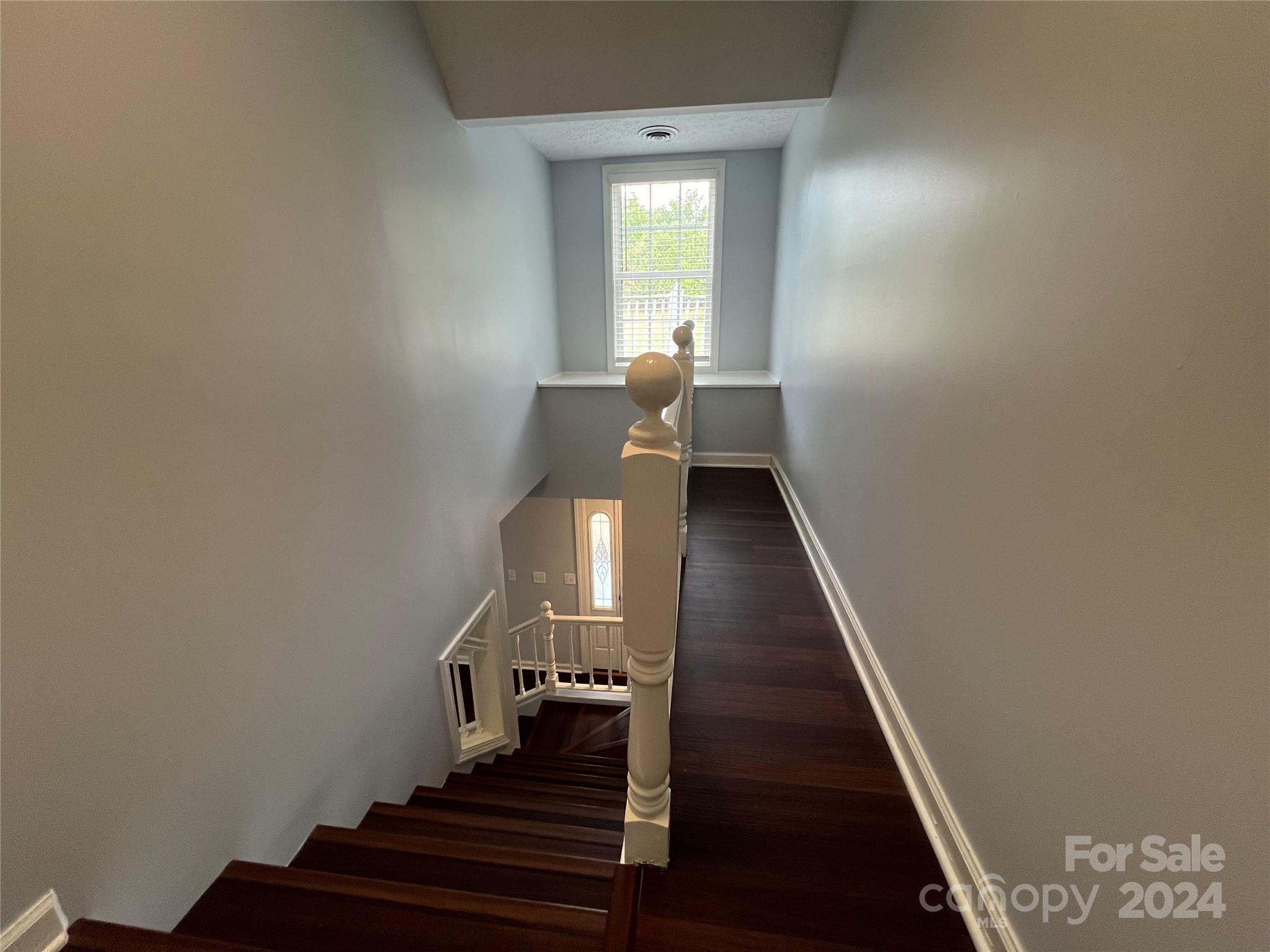 148 Riff Drive Forest City, NC 28043 - Photo 20 of 40 a view of entryway and hall with wooden floor
