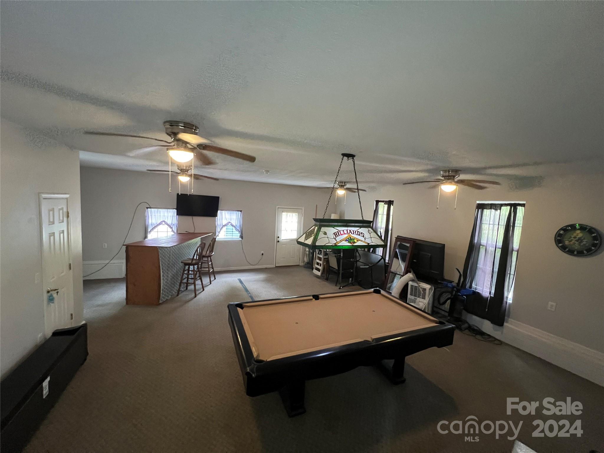 148 Riff Drive Forest City, NC 28043 - Photo 27 of 40 a view of a livingroom with furniture and a chandelier