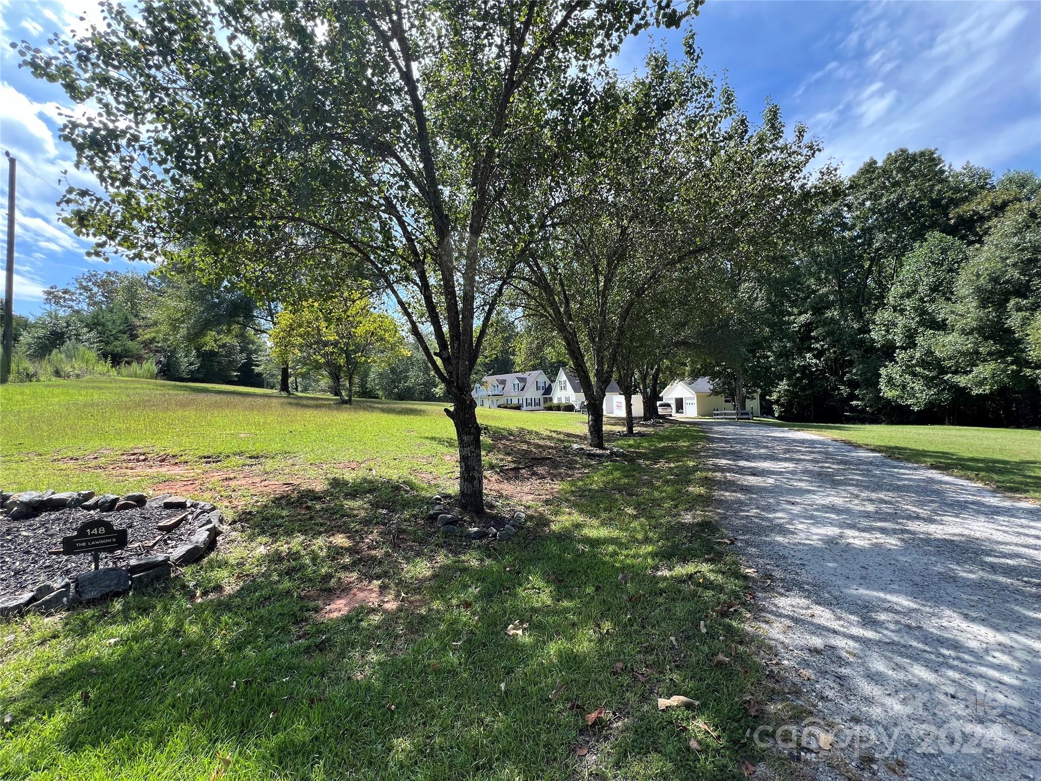 148 Riff Drive Forest City, NC 28043 - Photo 32 of 40 a view of a park with large trees