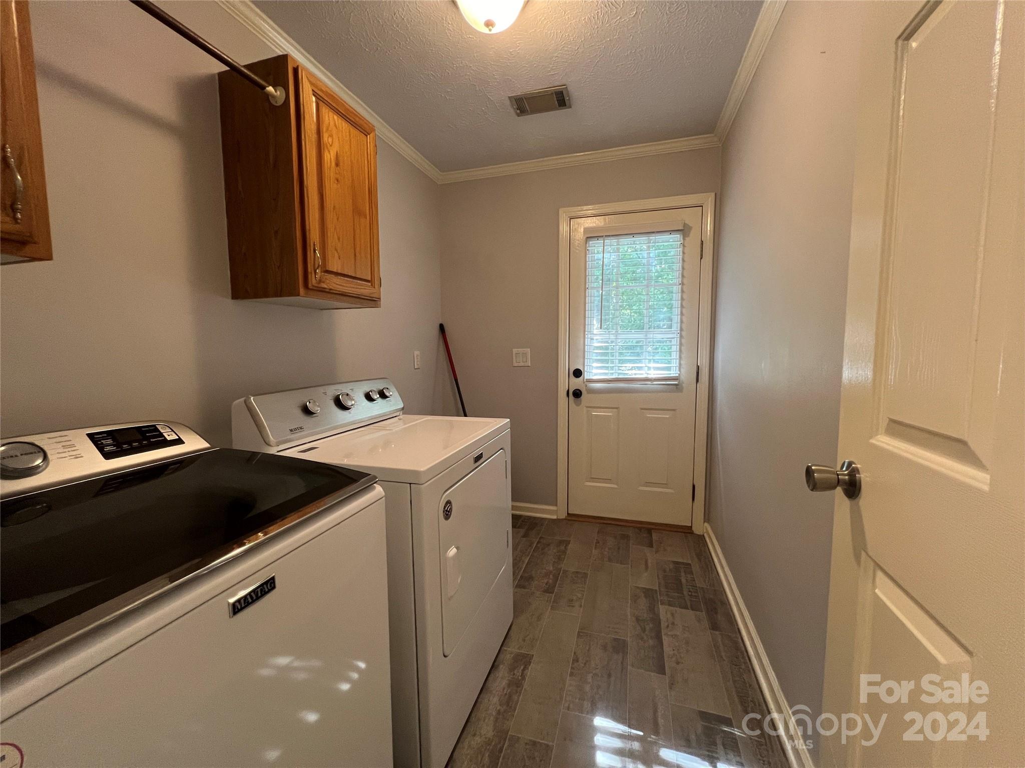 148 Riff Drive Forest City, NC 28043 - Photo 10 of 40 a utility room with dryer and washer