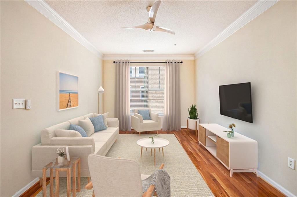 10 Perimeter Summit Boulevard, Unit 3301 Atlanta, GA 30319 - Photo 15 of 36 a living room with furniture and a flat screen tv
