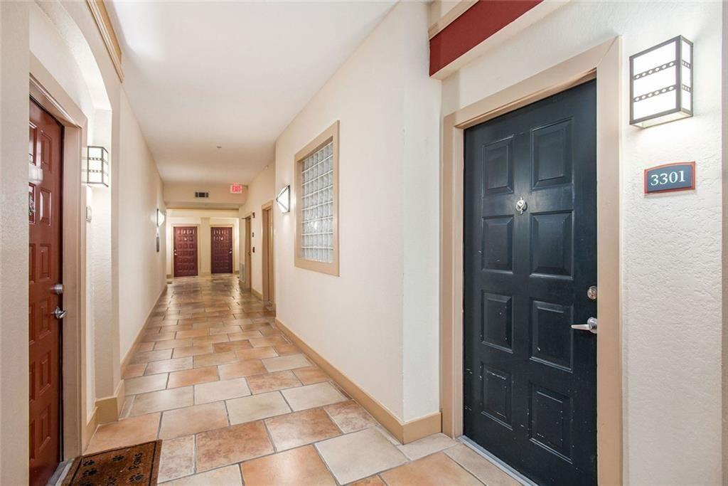 10 Perimeter Summit Boulevard, Unit 3301 Atlanta, GA 30319 - Photo 2 of 36 a view of a hallway