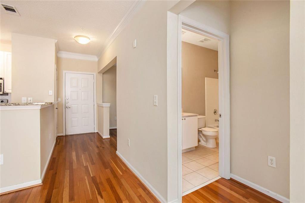 10 Perimeter Summit Boulevard, Unit 3301 Atlanta, GA 30319 - Photo 30 of 36 a bathroom with a sink and a toilet