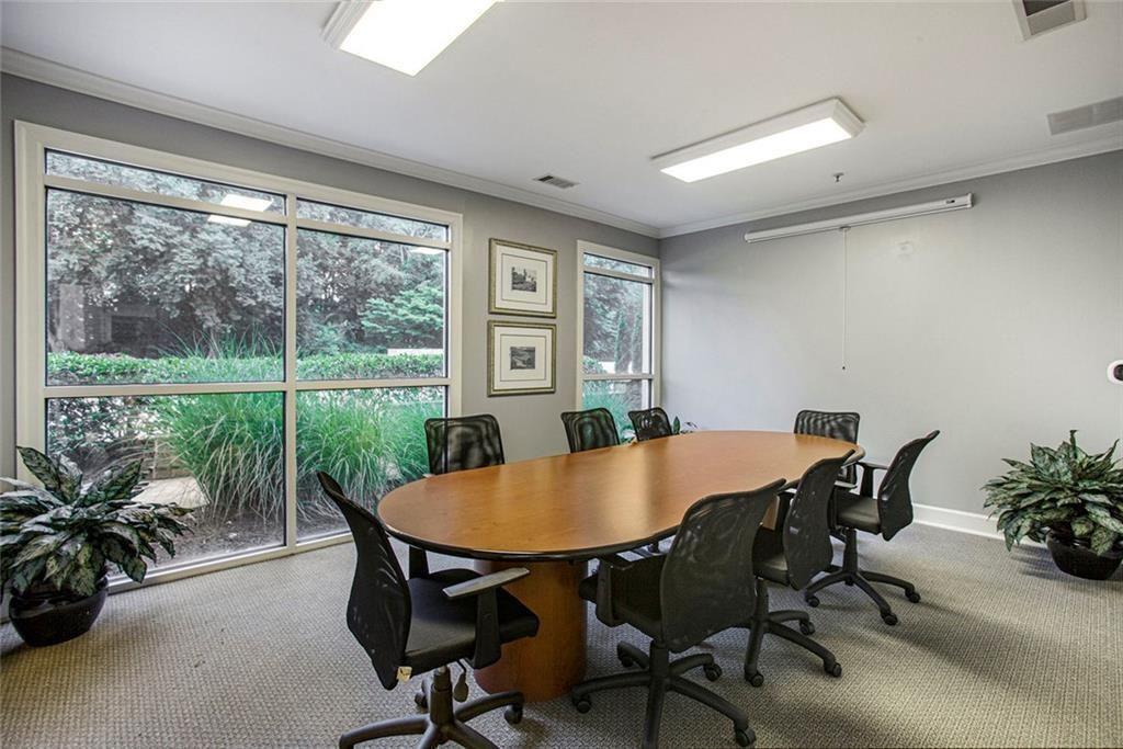 10 Perimeter Summit Boulevard, Unit 3301 Atlanta, GA 30319 - Photo 35 of 36 a view of a dining room with furniture window and outside view