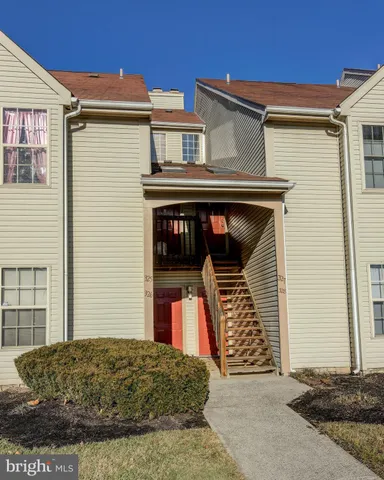 a view of a house with entrance gate