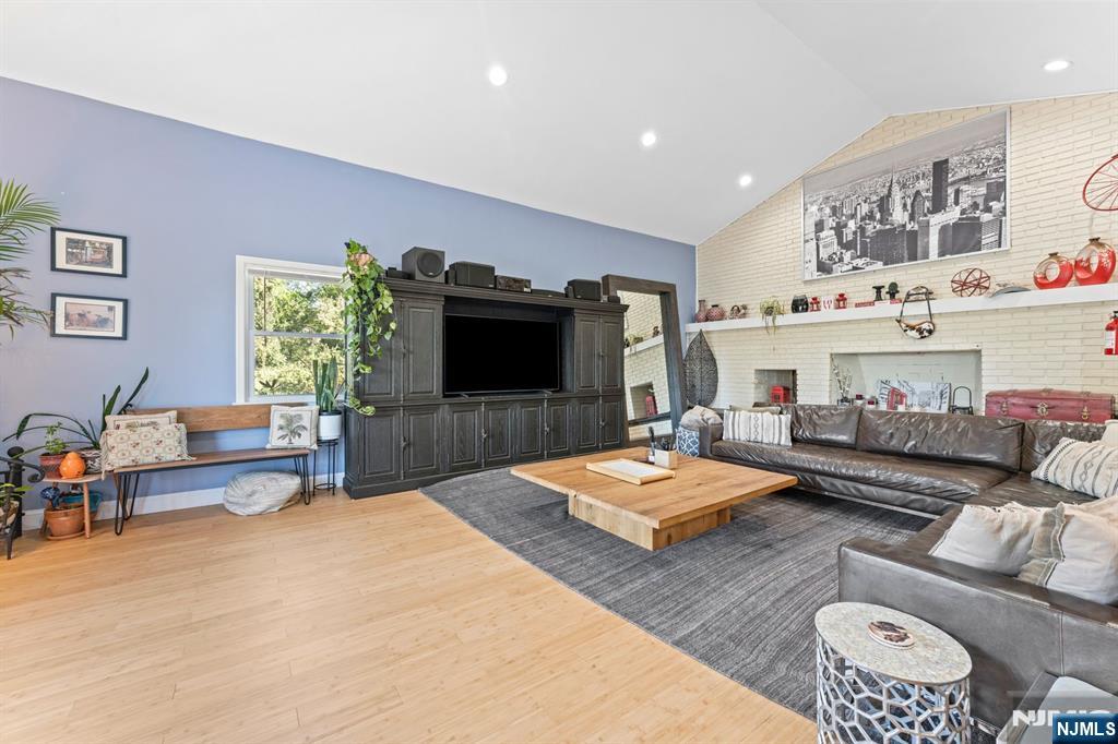 1 Rossi Drive Clinton, NJ 08809 - Photo 13 of 44 a living room with furniture and a flat screen tv