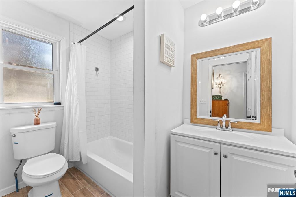 1 Rossi Drive Clinton, NJ 08809 - Photo 18 of 44 a bathroom with a toilet a sink and a bathtub