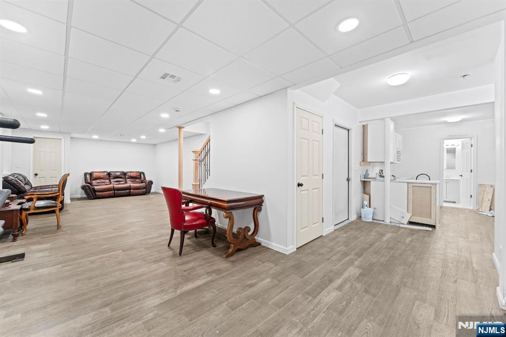 1 Rossi Drive Clinton, NJ 08809 - Photo 28 of 44 a view of a room with furniture and wooden floor