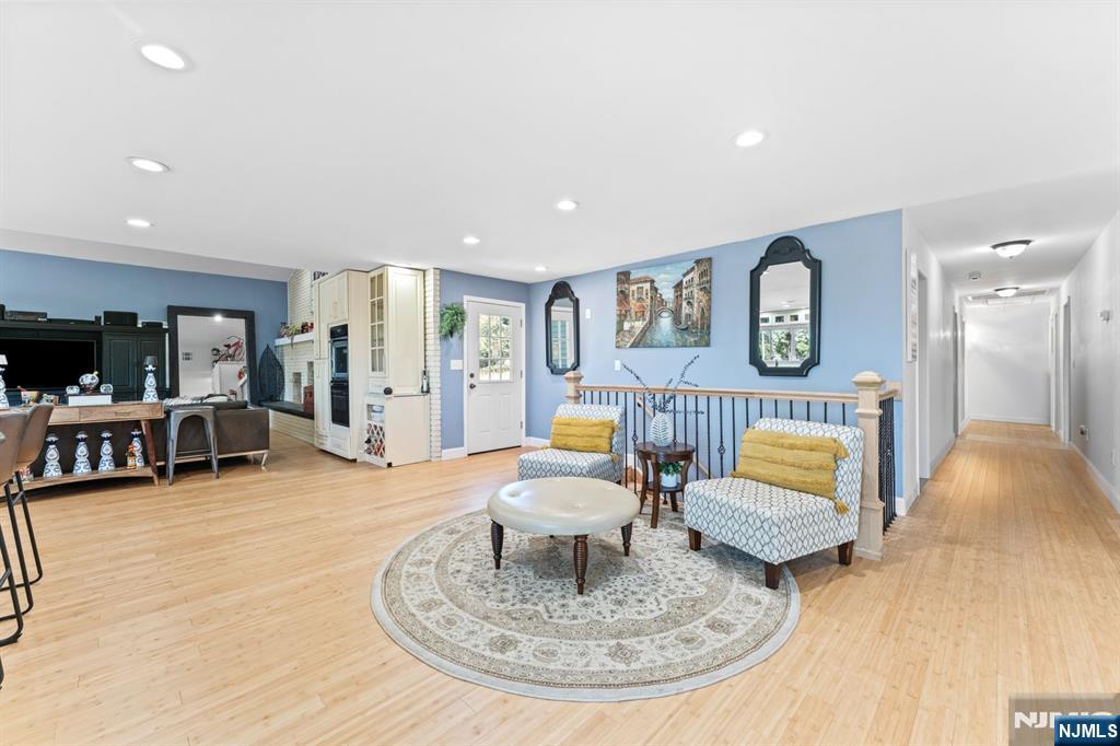 1 Rossi Drive Clinton, NJ 08809 - Photo 6 of 44 a living room with furniture and a table with potted plants