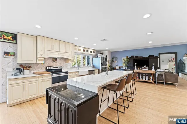 a bathroom with a toilet a sink and a bathtub