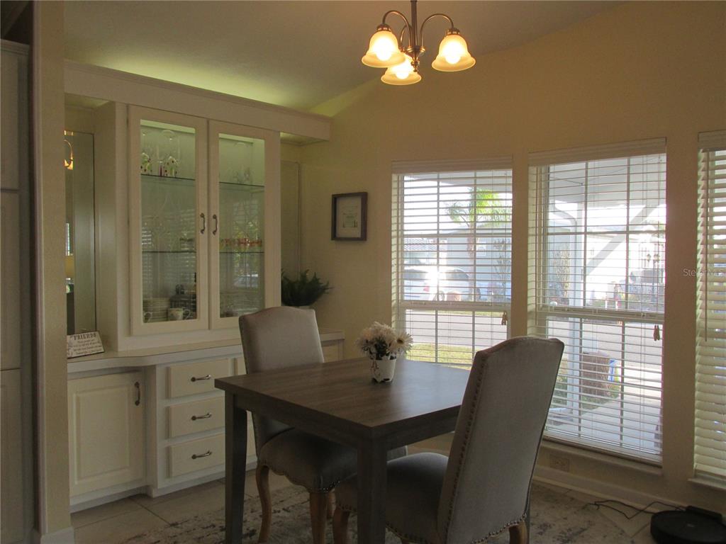 12 Saddle Bag Road Lake Wales, FL 33898 - Photo 6 of 34 a view of a dining room with furniture window and outside view