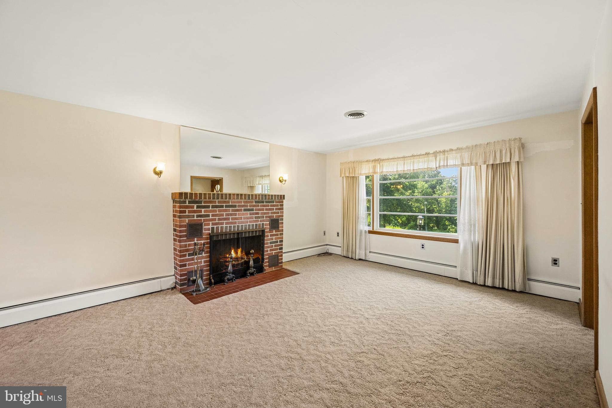 30 Coulter Lane Rising Sun, MD 21911 - Photo 12 of 45 Spacious living room with wood burning fireplace.