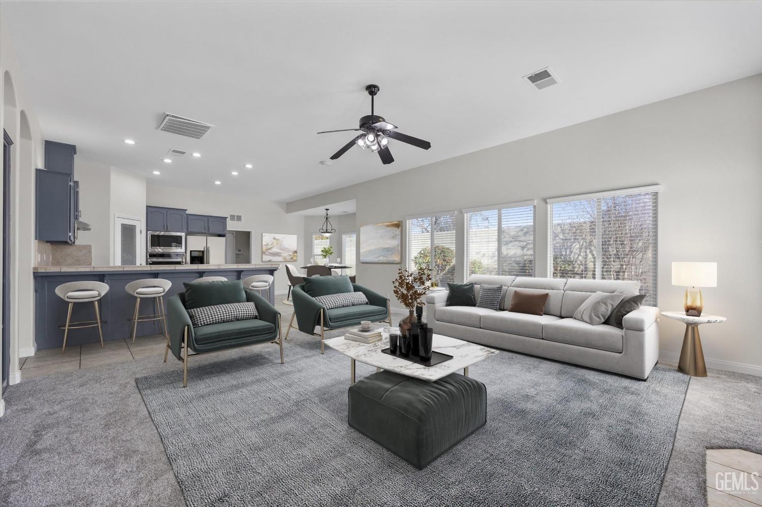 Undisclosed Address Bakersfield, CA 93313 - Photo 12 of 44 a living room with furniture and a large window