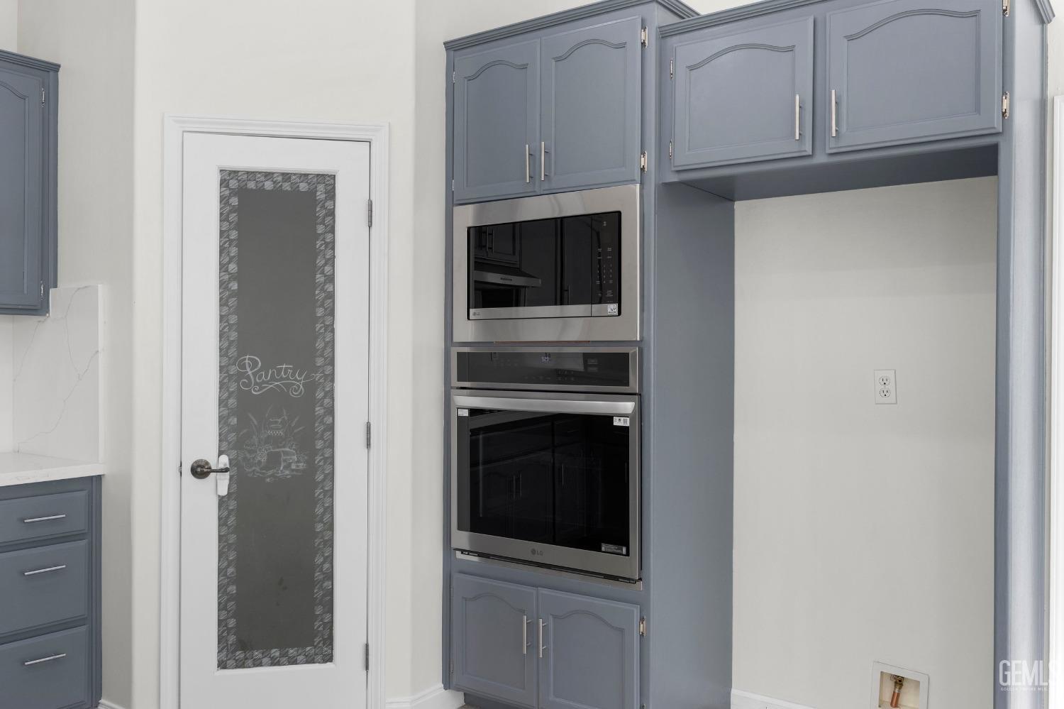 Undisclosed Address Bakersfield, CA 93313 - Photo 23 of 44 a view of a livingroom with a fireplace