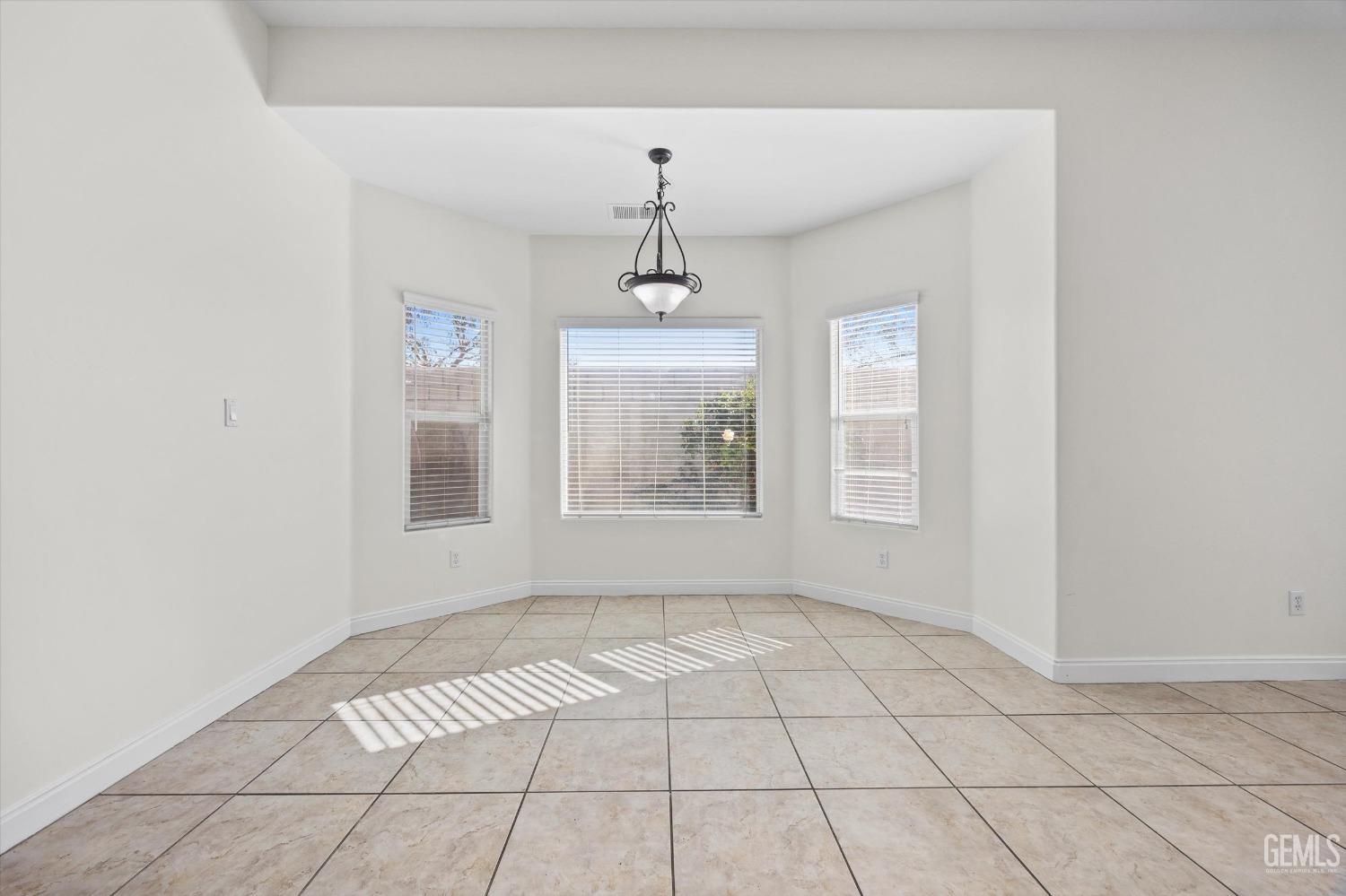 Undisclosed Address Bakersfield, CA 93313 - Photo 24 of 44 a view of an empty room with a window