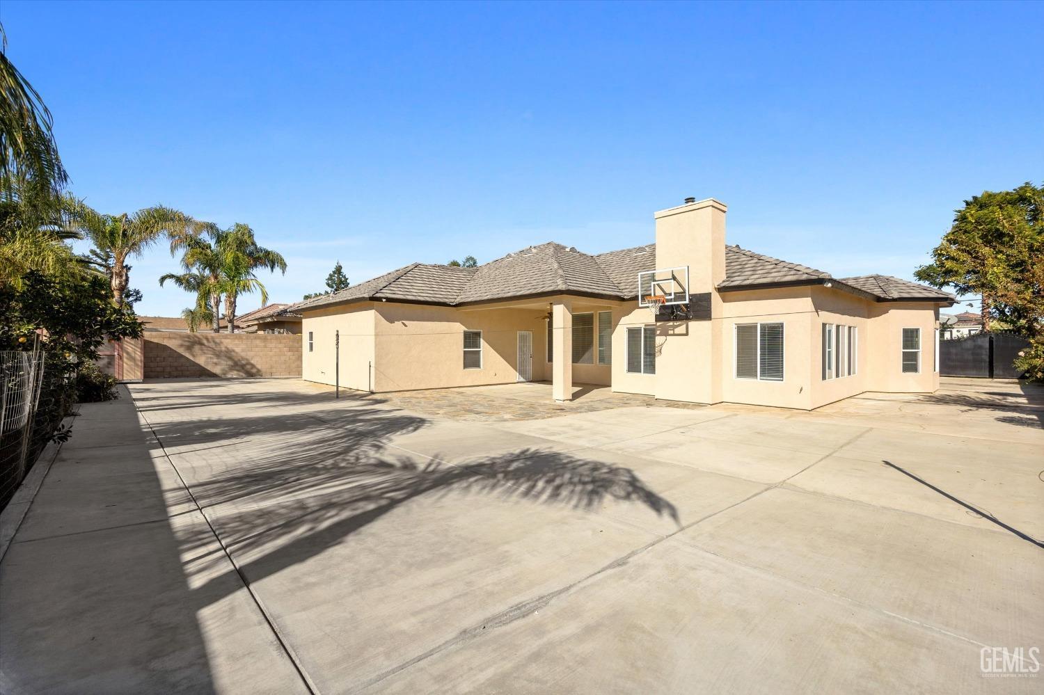 Undisclosed Address Bakersfield, CA 93313 - Photo 41 of 44 a view of a house with a yard