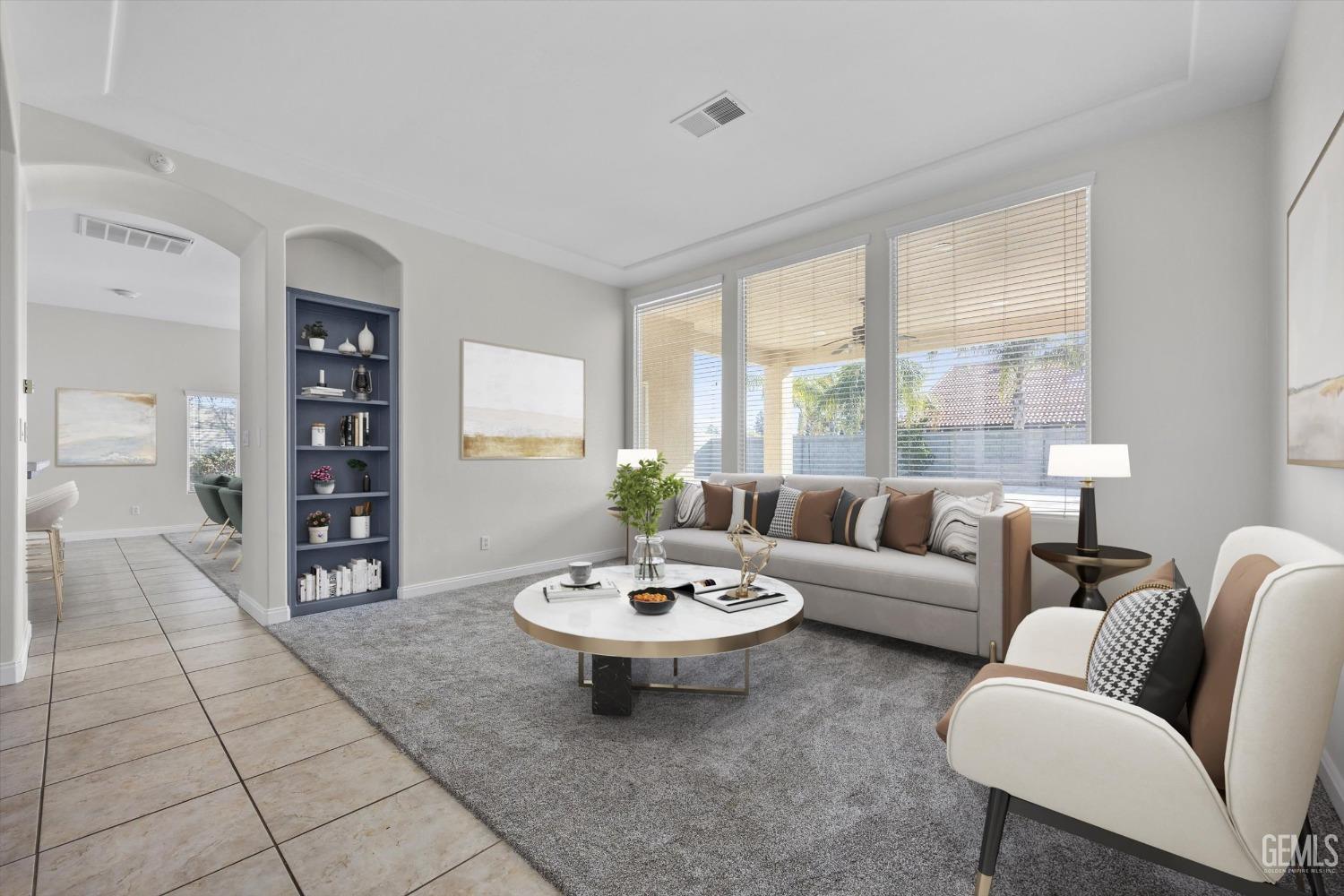 Undisclosed Address Bakersfield, CA 93313 - Photo 5 of 44 a living room with furniture a table and a large window