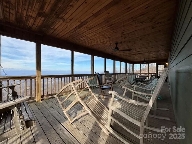 a view of a balcony with chairs