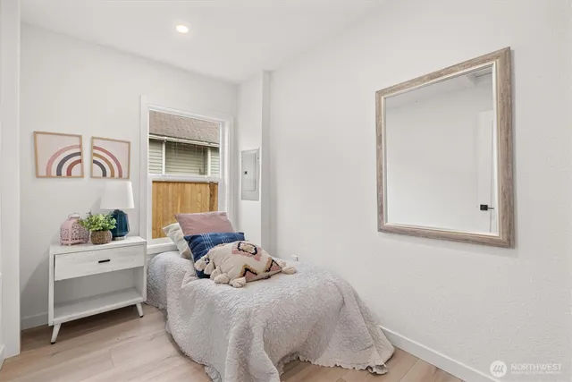 a bed room with a bed and a couch