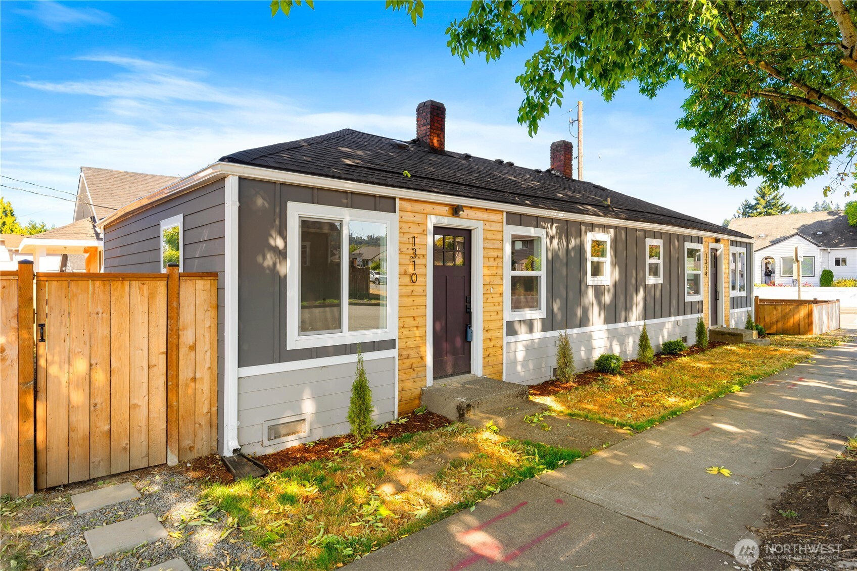 1310 North 3rd Street Renton, WA 98057 - Photo 16 of 16 a front view of a house with a outdoor space