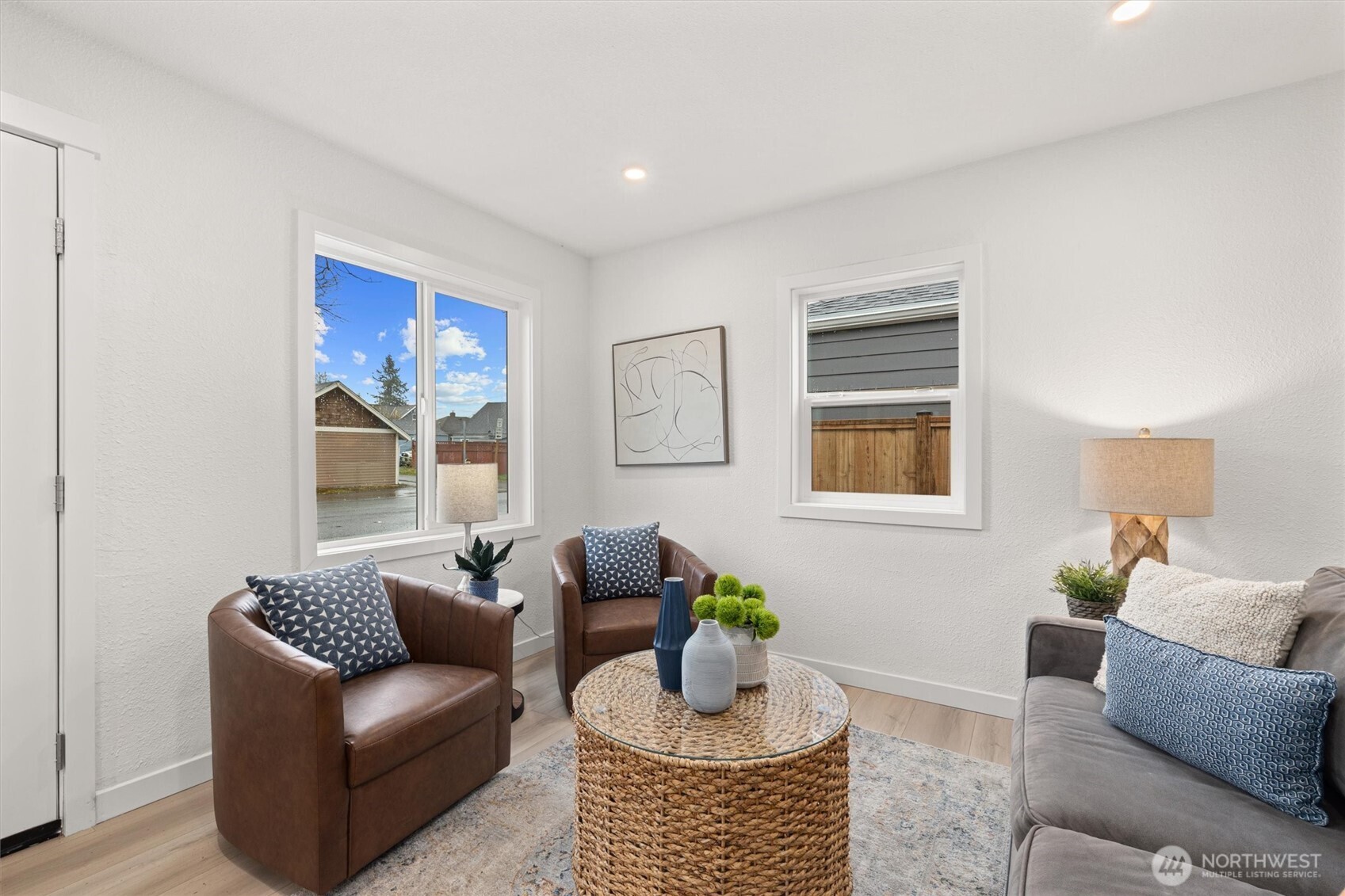 1310 North 3rd Street Renton, WA 98057 - Photo 3 of 16 a living room with furniture and a potted plant