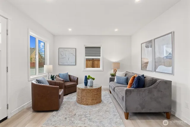 a living room with furniture and a couch