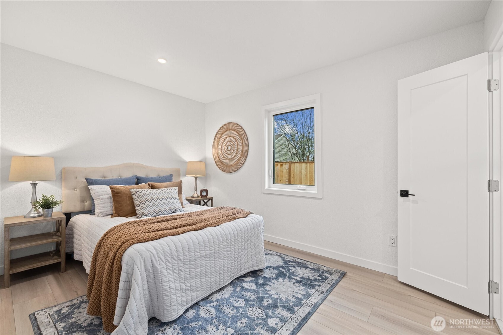 1310 North 3rd Street Renton, WA 98057 - Photo 9 of 16 a bedroom with a bed and a window