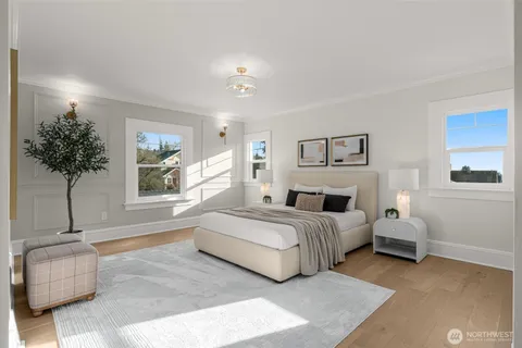 a spacious bedroom with a bed and a window