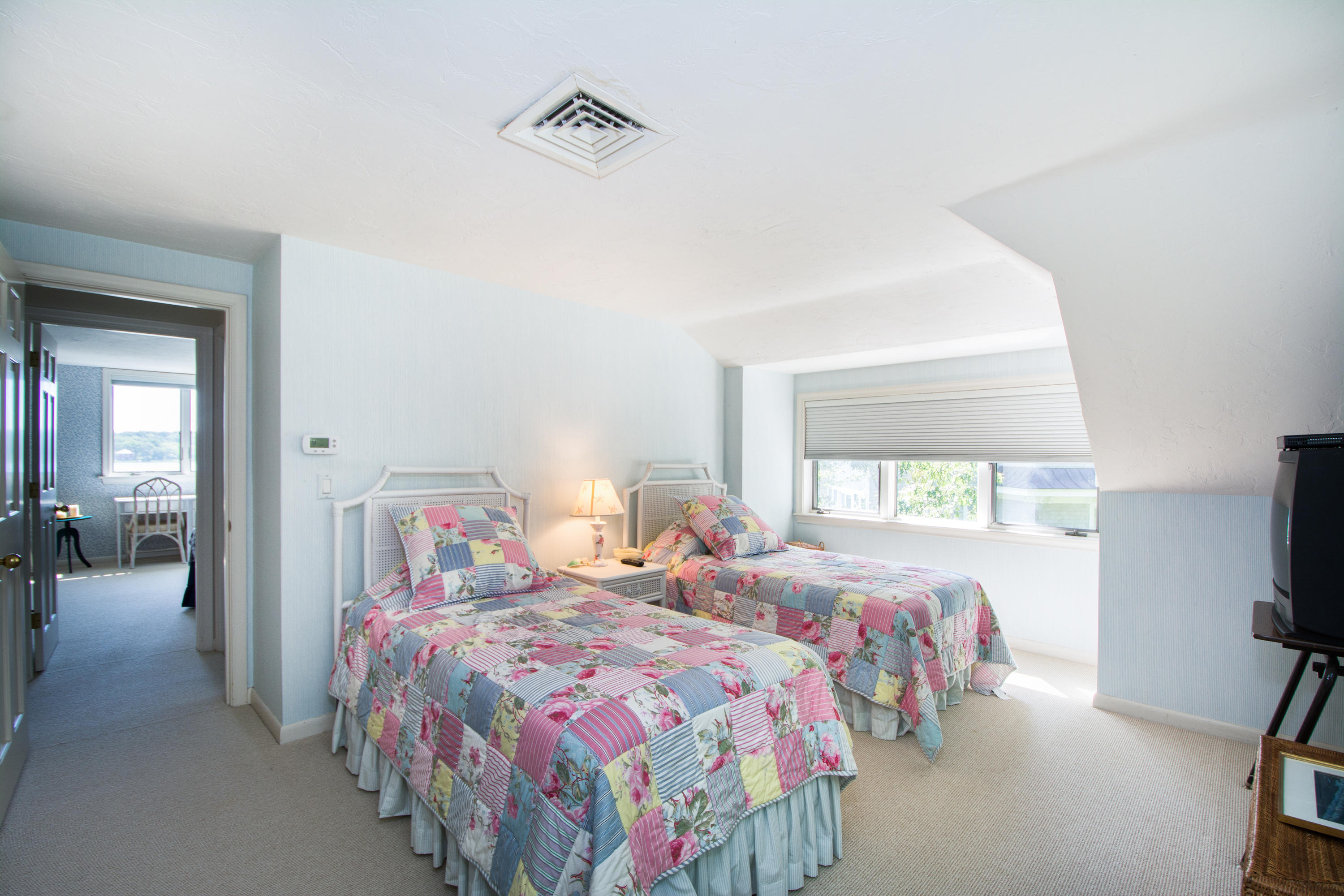 107 Tide Run Mashpee, MA 02649 - Photo 29 of 35 a bedroom with two beds and a flat screen tv