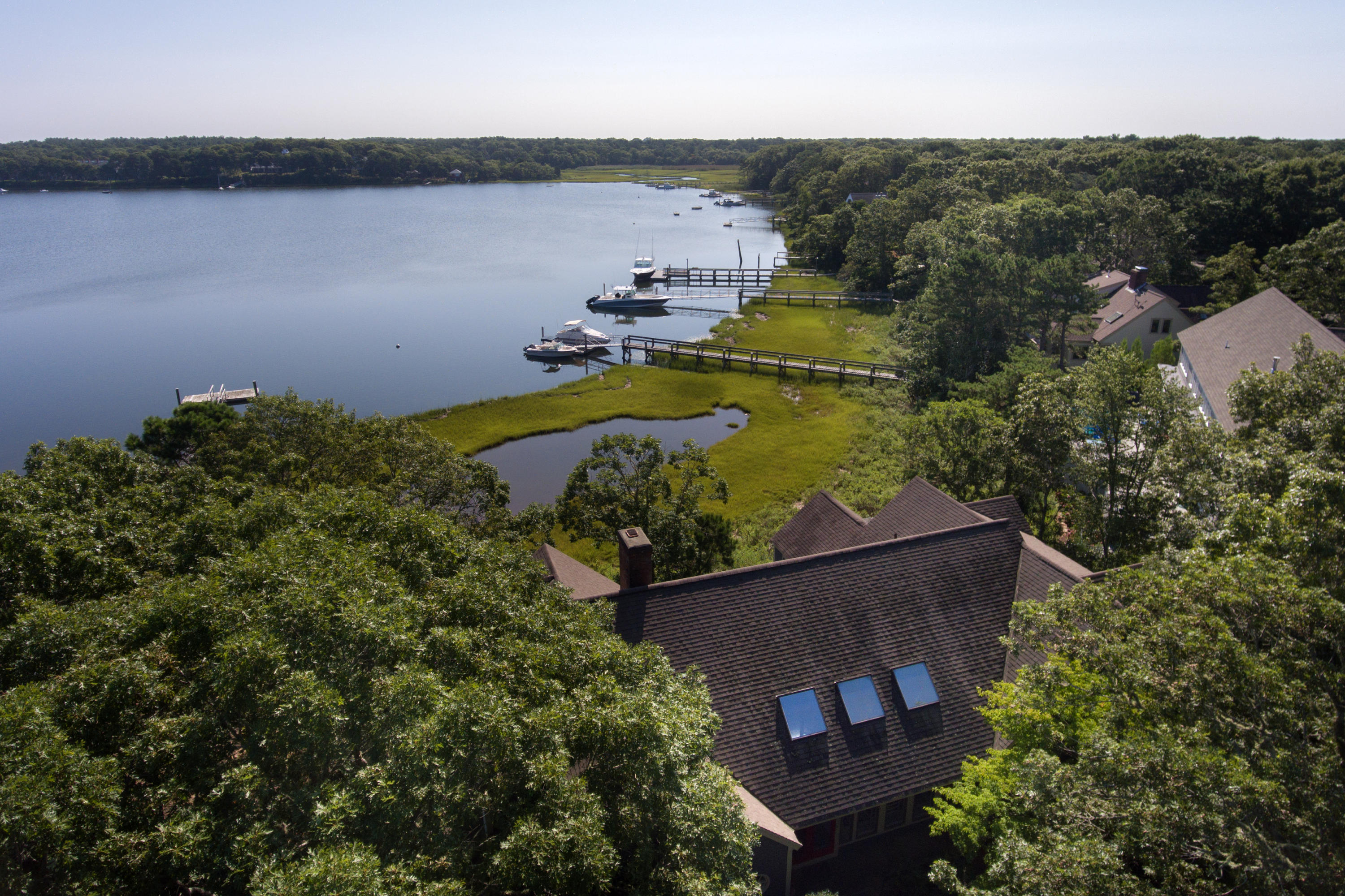 107 Tide Run Mashpee, MA 02649 - Photo 34 of 35 an aerial view of a house with a lake view