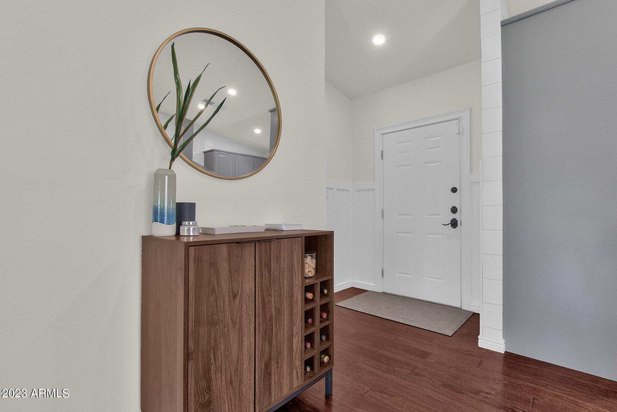 6867 East Phelps Road Scottsdale, AZ 85254 - Photo 18 of 20 a view of a livingroom with wooden floor