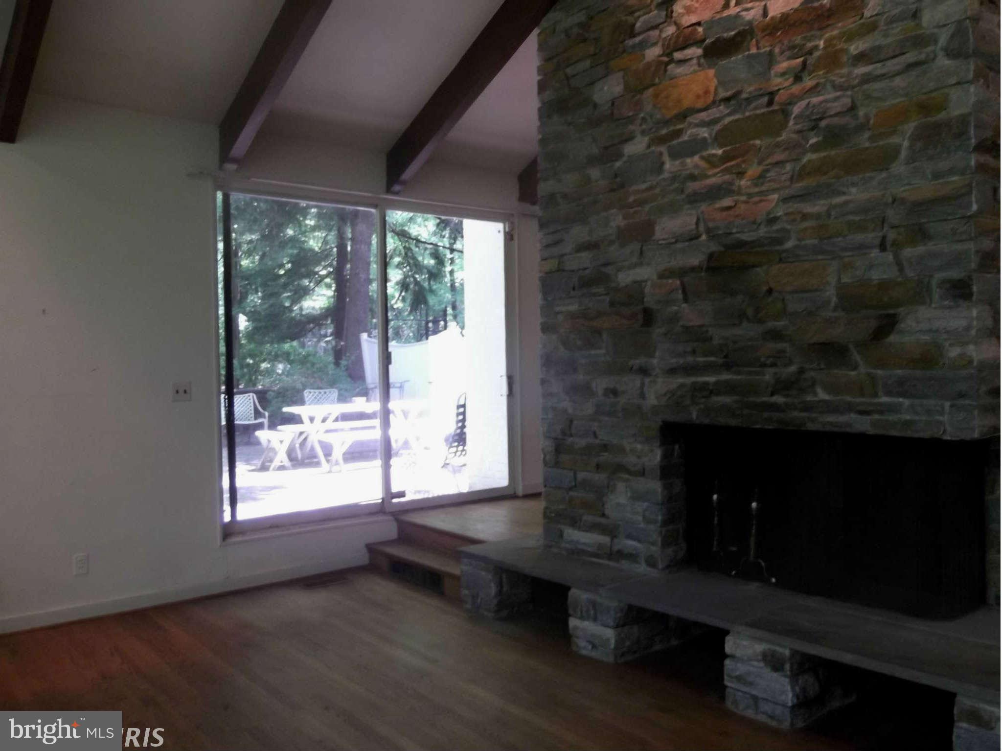 3014 Caves Road Owings Mills, MD 21117 - Photo 5 of 25 2 Sided, 2 Story Stone Fireplace