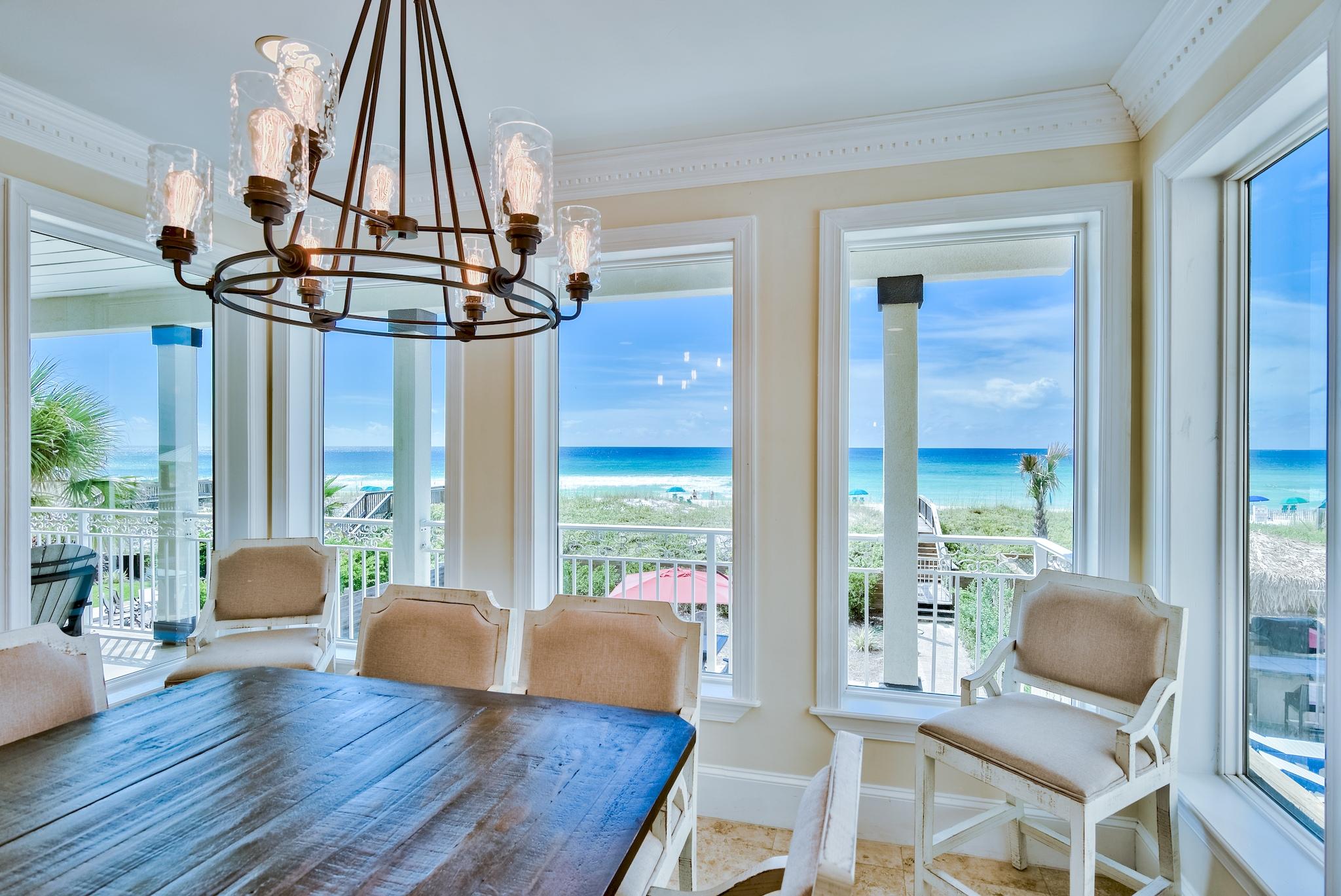 114 Sandprint Circle Destin, FL 32541 - Photo 12 of 57 a dining room with wooden floor and windows