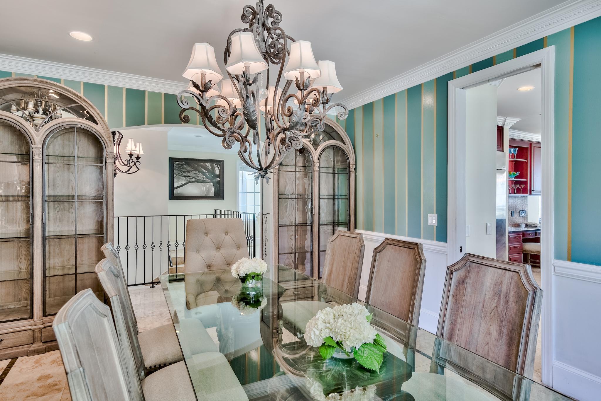 114 Sandprint Circle Destin, FL 32541 - Photo 22 of 57 a view of living room filled with furniture and chandelier