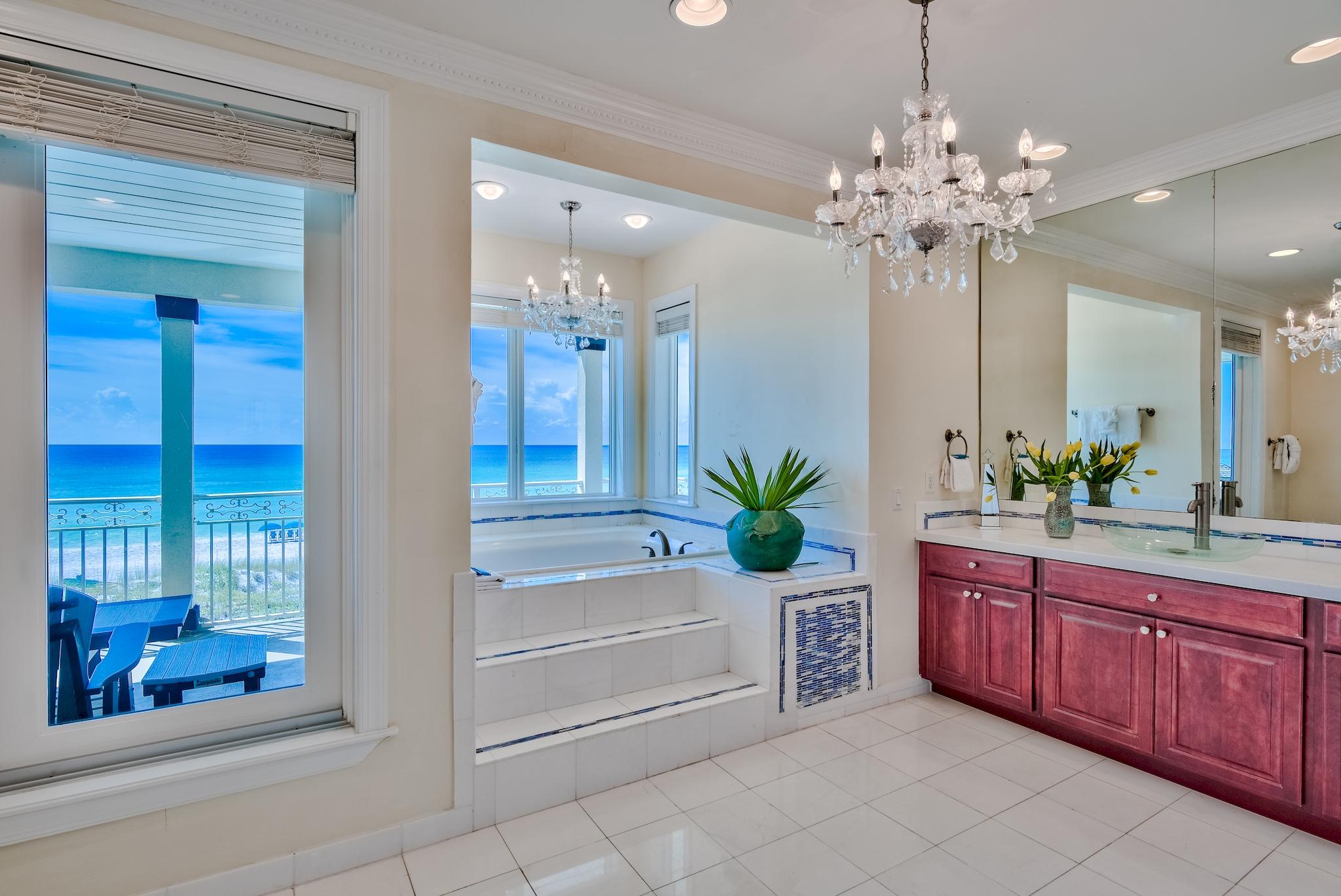 114 Sandprint Circle Destin, FL 32541 - Photo 26 of 57 a spacious en suite bathroom with a granite countertop sink a large mirror and a bathtub